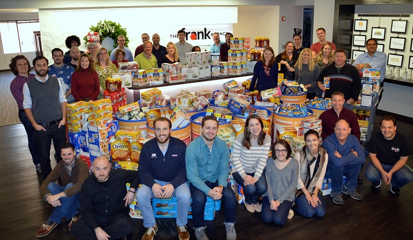 The frank Agency employees with their food donations to Harvesters Community Food Network