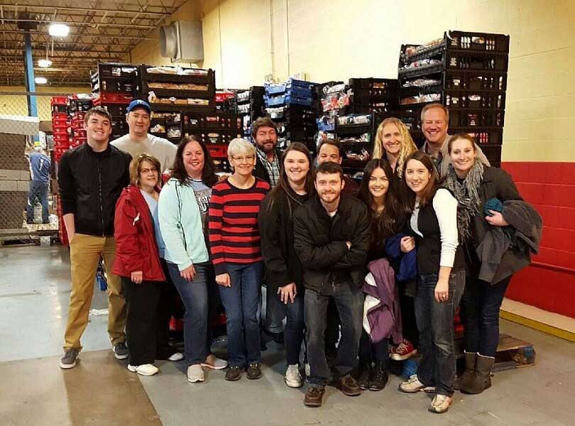 The frank Agency employees volunteering at Harvesters Community Food Network, Day 1